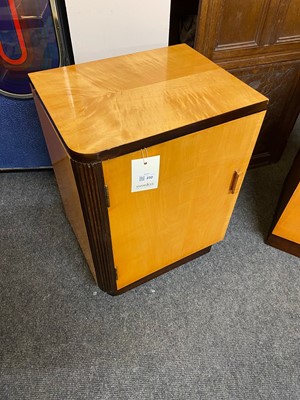 Lot 232 - A pair of Art Deco maple bedside cupboards