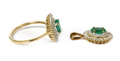 Lot 128 - A 9ct gold emerald and diamond cluster ring