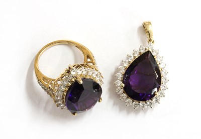 Lot 137 - A 9ct gold pear cut amethyst and zircon cluster ring