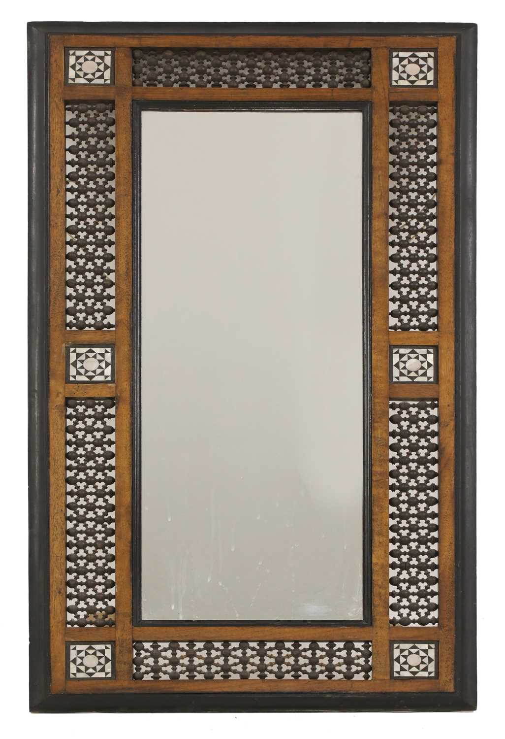 Lot 34 - An Aesthetic Movement Moorish mahogany mirror