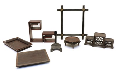 Lot 89 - A collection of Chinese wood stands