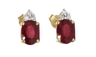 Lot 92 - A pair of 9ct gold fracture filled ruby and diamond earrings