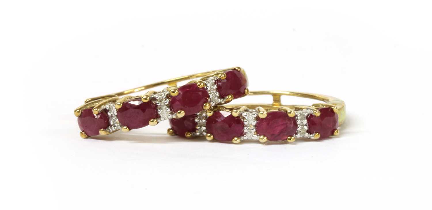 Lot 93 - A pair of 9ct gold fracture filled ruby and diamond hoop earrings