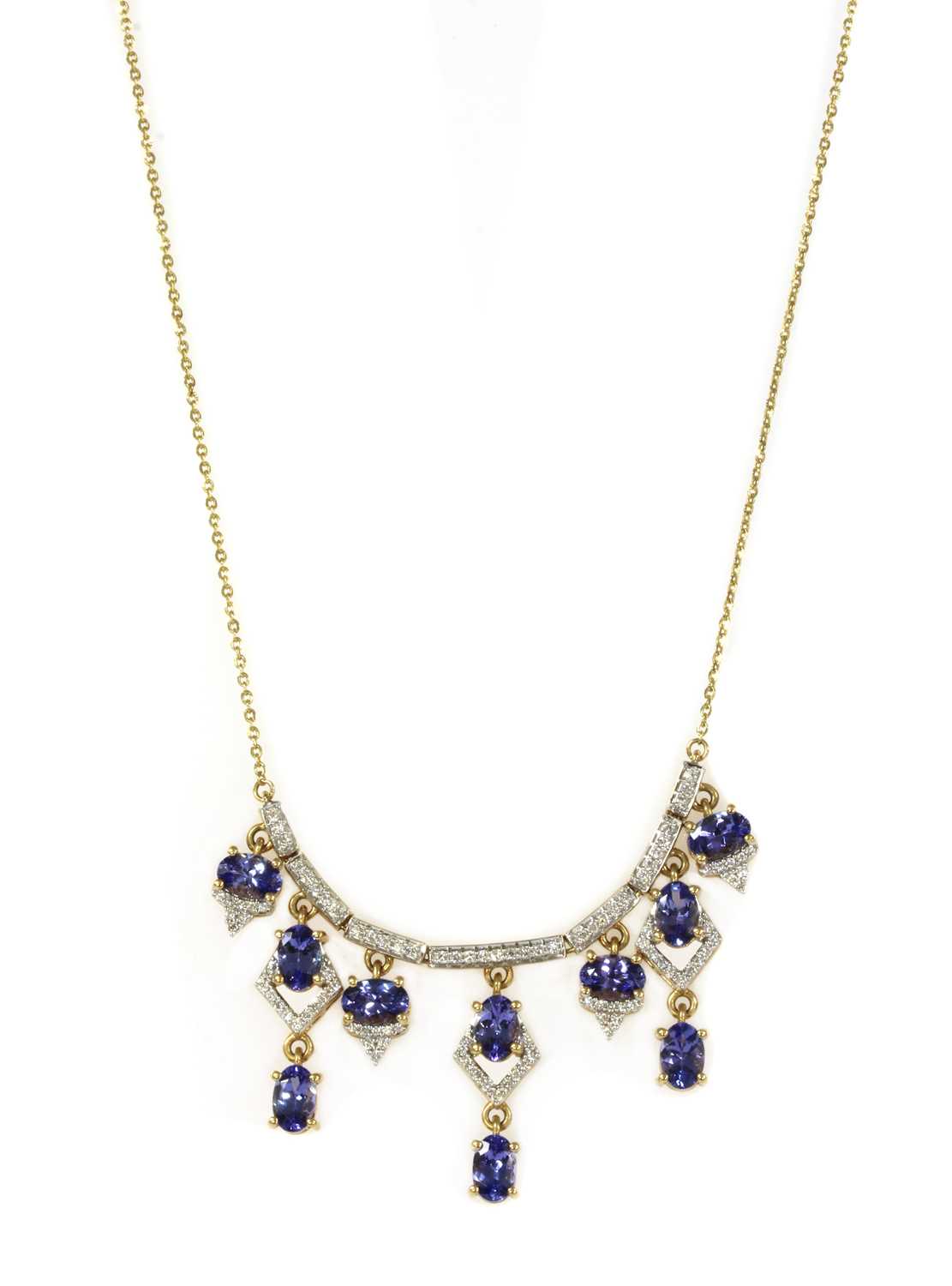 Lot 116 - An 18ct gold tanzanite and diamond fringe necklace