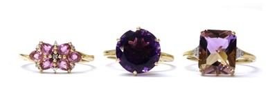 Lot 218 - A 9ct gold pink sapphire and diamond ring
