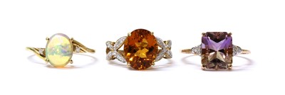 Lot 219 - A 9ct gold ametrine and diamond ring