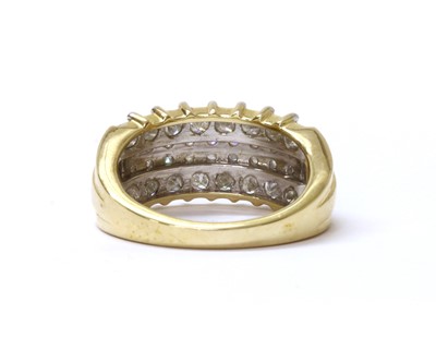 Lot 66 - A 9ct gold four row diamond ring