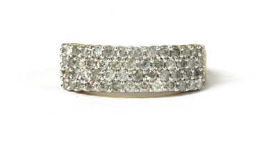 Lot 27 - A 9ct gold four row diamond ring