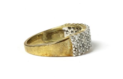 Lot 27 - A 9ct gold four row diamond ring