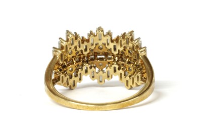 Lot 31 - A 9ct gold baguette and brilliant cut diamond ring