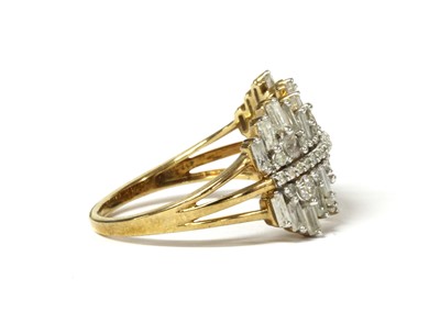 Lot 31 - A 9ct gold baguette and brilliant cut diamond ring