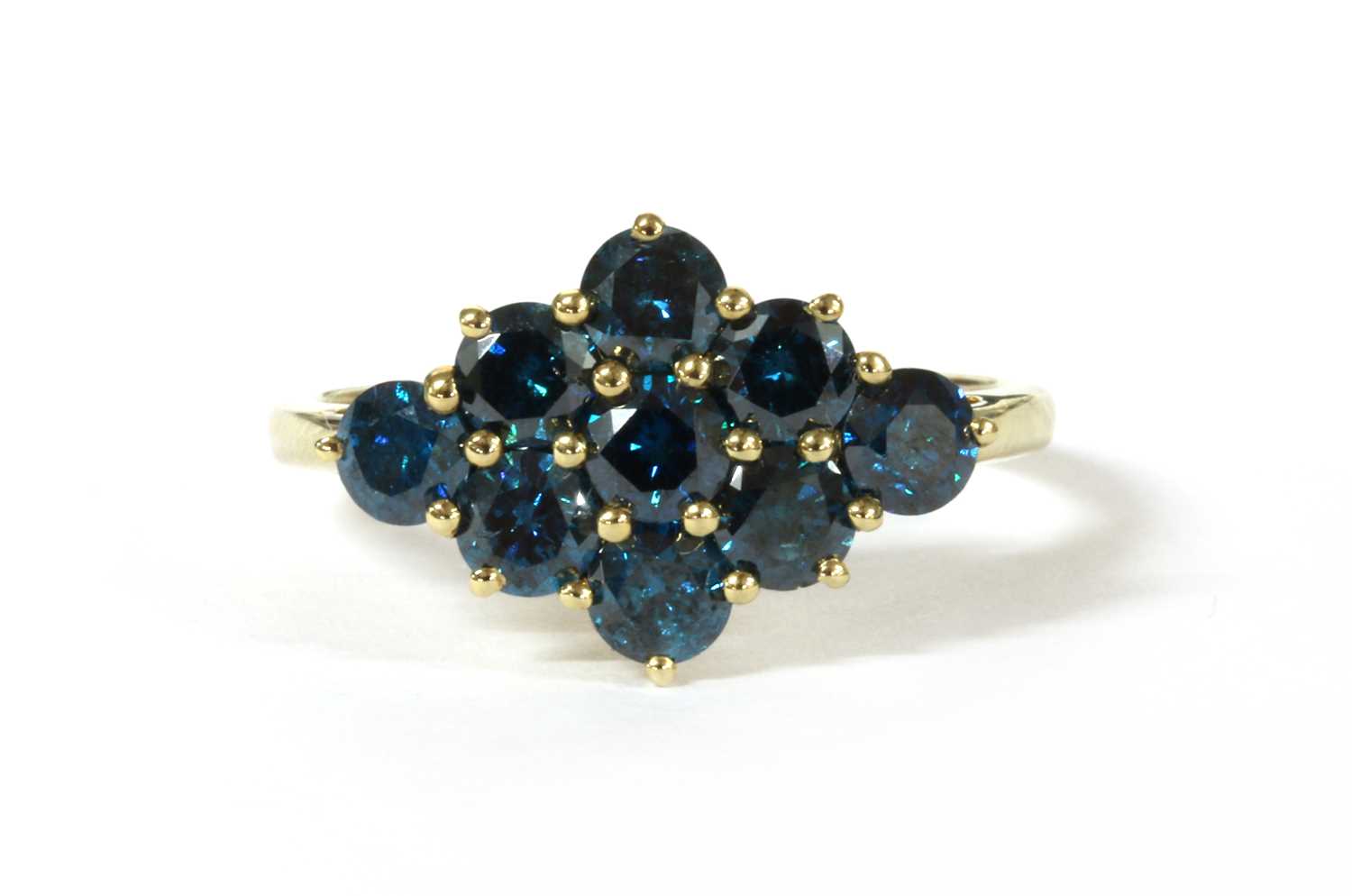 Lot 36 - A 9ct gold treated blue diamond ring