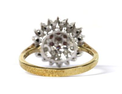 Lot 130 - A 9ct gold treated diamond cluster ring