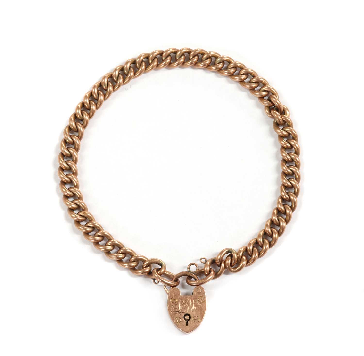 Lot 1105 - An Edwardian 9ct gold curb link bracelet, by Saunders & Shepherd