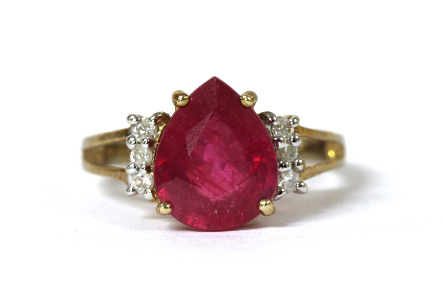Lot 88 - A 9ct gold fracture filled ruby and diamond ring