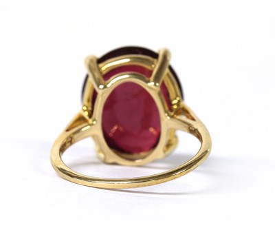 Lot 89 - A 9ct gold single stone fracture filled ruby ring