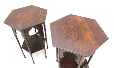Lot 422 - A near pair of Liberty style Moorish oak side tables
