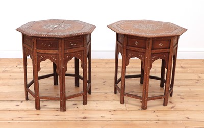 Lot 263 - A near pair of Indian octagonal teak occasional tables