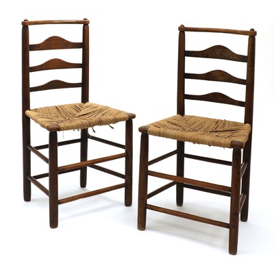 Lot 353 - A pair of Arts and Crafts oak chairs