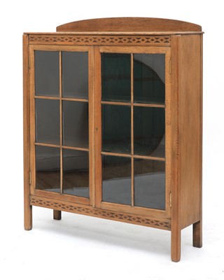 Lot 324 - A Cotswold School bookcase