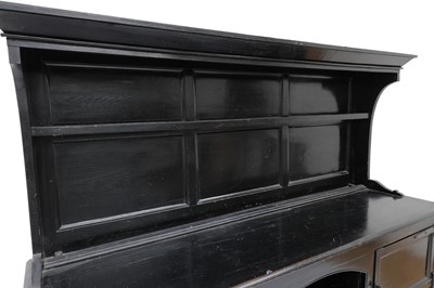 Lot 105 - An Arts and Crafts ebonised sideboard