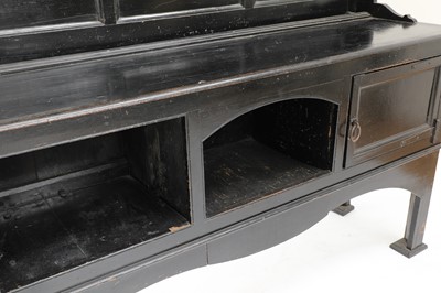 Lot 105 - An Arts and Crafts ebonised sideboard
