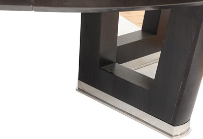 Lot 777 - A contemporary ebonised ash extending dining table