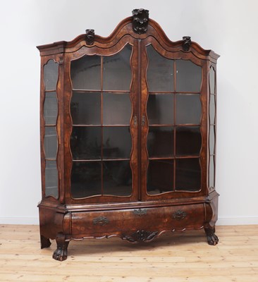 Lot 232 - A walnut display cabinet