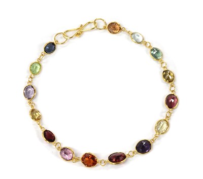 Lot 1234 - A gold assorted gemstone bracelet