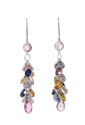 Lot 1233 - A pair of white gold varicoloured sapphire drop earrings