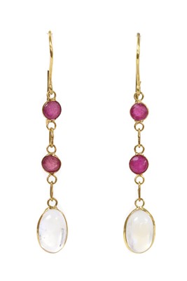 Lot 1224 - A pair of gold moonstone and ruby drop earrings