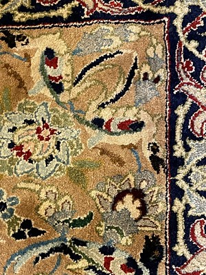 Lot 248 - A Persian silk carpet