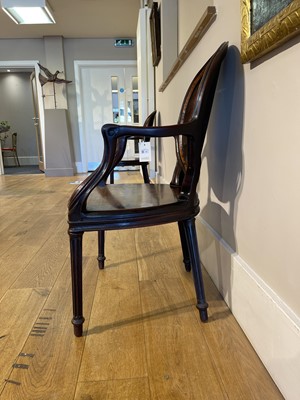 Lot 12 - A pair of mahogany hall chairs