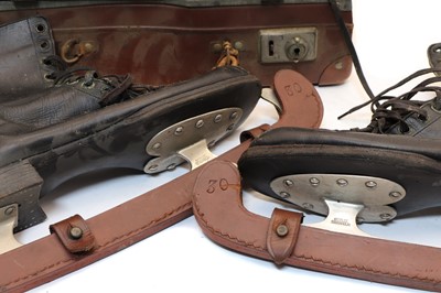 Lot 263 - A cased pair of vintage ice skates