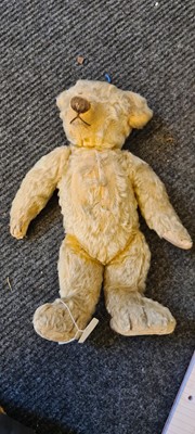 Lot 327 - A blonde plush teddy bear