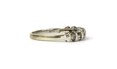 Lot 47 - A white gold diamond half eternity ring