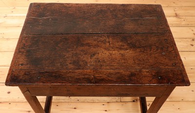 Lot 444 - A George III oak side table