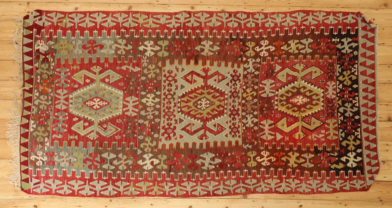 Lot 490 - A kilim flatweave rug