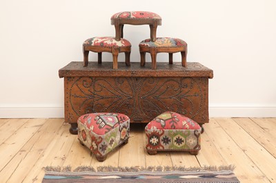 Lot 266 - A collection of kilim-upholstered footstools