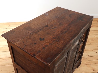 Lot 414 - An oak chest of drawers
