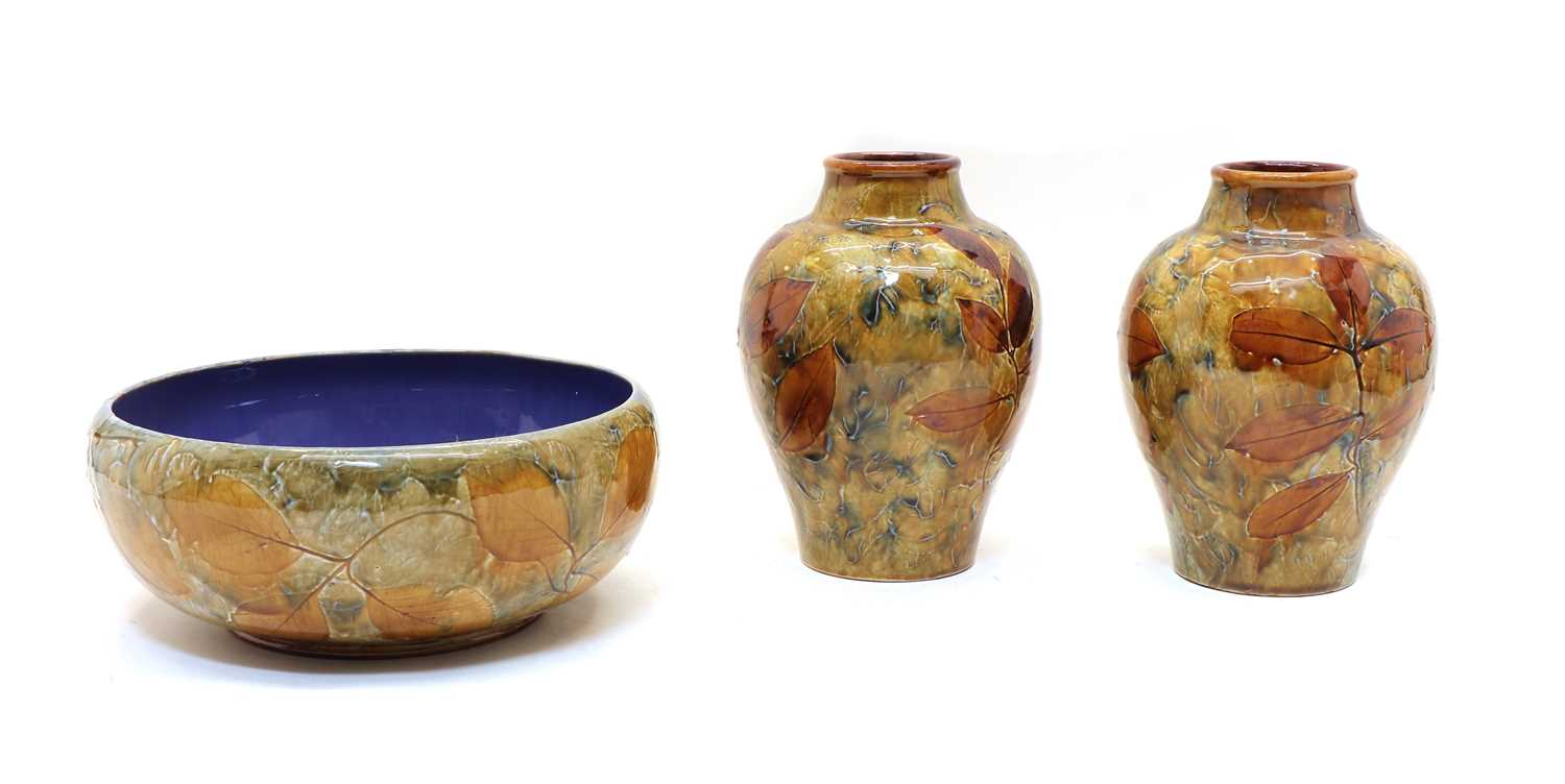 Lot 157 - A pair of Royal Doulton urns