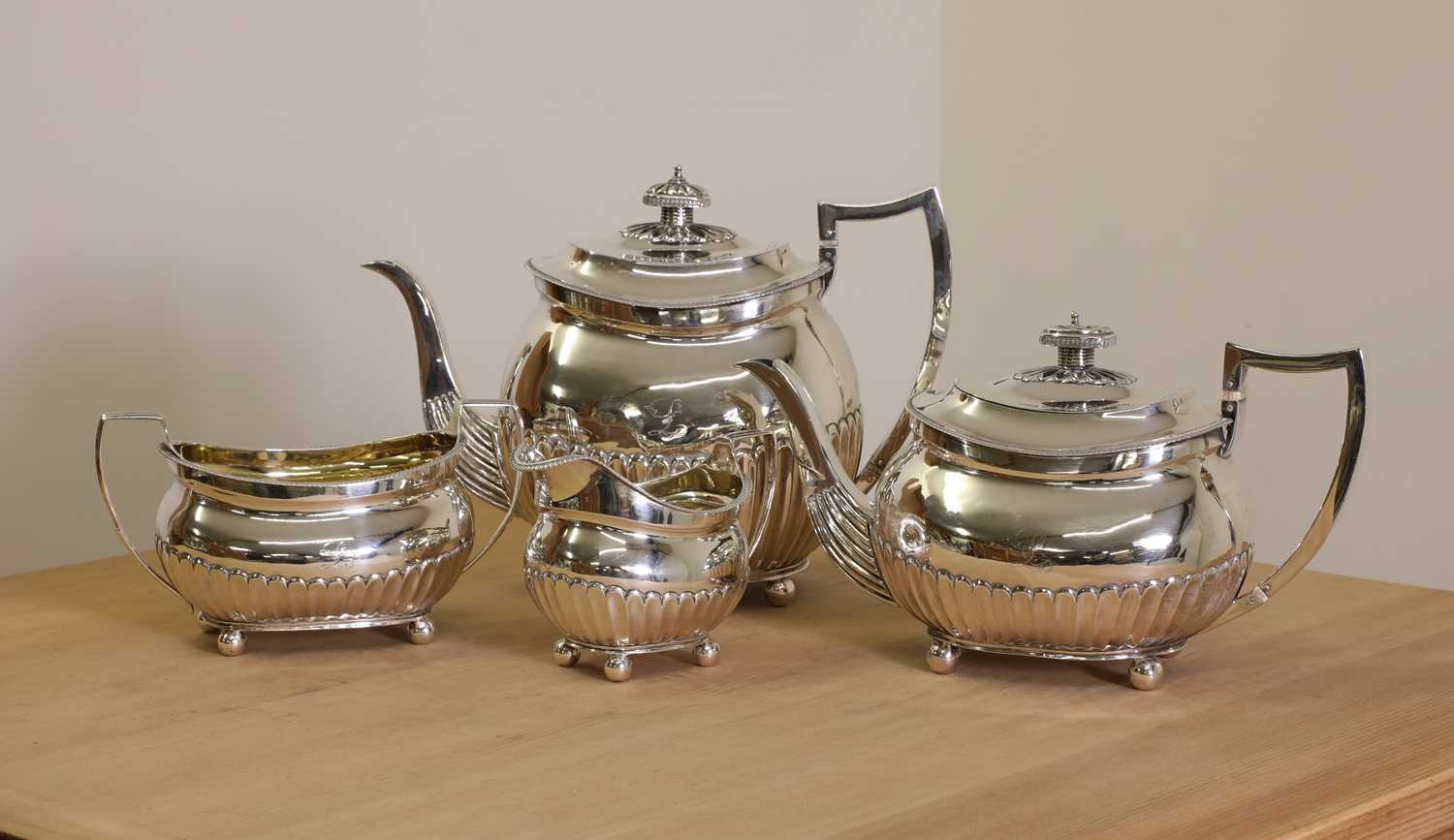 Lot 351 - A George III four-piece silver tea service,
