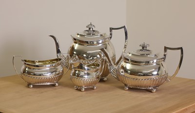 Lot 351 - A George III four-piece silver tea service