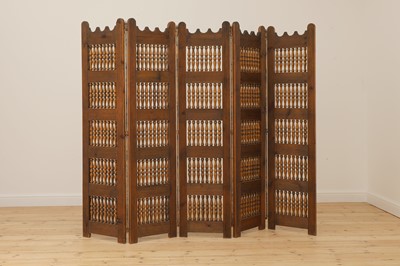 Lot 478 - A Spanish fruitwood folding screen