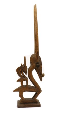 Lot 188 - An African sculpture, Chiwara, female antelope with baby