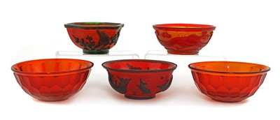 Lot 73 - A collection of three Chinese overlay Peking glass bowls