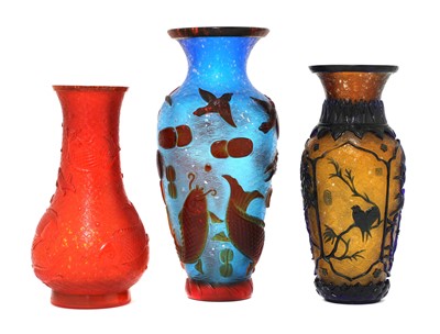 Lot 79 - Three Chinese overlay Peking glass vases