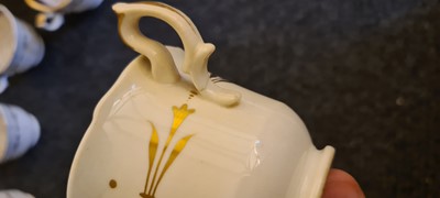 Lot 179 - A 19th century Rockingham style porcelain tea set