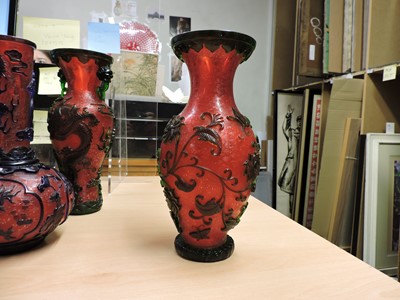 Lot 77 - Three Chinese overlay Peking glass vases