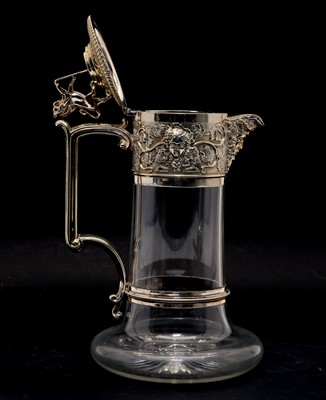 Lot 150 - A silver-plated claret jug